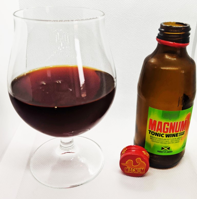 Magnum Tonic Wine Bottle Poured Into Glass